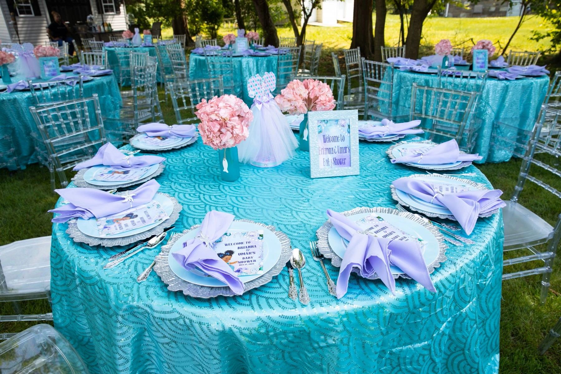 Elegantly decorated outdoor event table at a baby shower